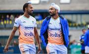 2 June 2025; India players Jugraj Singh, right, and Rajinder Singh after their victory in the Men's International Hockey match between Ireland and India at Pembroke Wanderers Hockey Club in Dublin. Photo by Shauna Clinton/Sportsfile