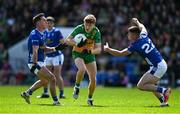 1 June 2025; Ciarán Moore of Donegal in action against Killian Brady and James Smith of Cavan during the GAA Football All-Ireland Senior Championship Round 2 match between Cavan and Donegal at Kingspan Breffni in Cavan. Photo by Brendan Moran/Sportsfile