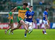 1 June 2025; Dáire Ó Baoill of Donegal in action against Cian Reilly of Cavan during the GAA Football All-Ireland Senior Championship Round 2 match between Cavan and Donegal at Kingspan Breffni in Cavan. Photo by Brendan Moran/Sportsfile