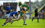 1 June 2025; Ciarán Moore of Donegal in action against Cian Reilly of Cavan during the GAA Football All-Ireland Senior Championship Round 2 match between Cavan and Donegal at Kingspan Breffni in Cavan. Photo by Brendan Moran/Sportsfile