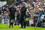 1 June 2025; Donegal manager Jim McGuinness, right, stand by referee Sean Hurson during the GAA Football All-Ireland Senior Championship Round 2 match between Cavan and Donegal at Kingspan Breffni in Cavan. Photo by Brendan Moran/Sportsfile