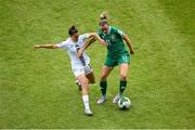3 June 2025; Katie McCabe of Republic of Ireland in action against Sara Makovec of Slovenia during the UEFA Women's Nations League, League B match between Republic of Ireland and Slovenia at Páirc Uí Chaoimh in Cork. Photo by Shauna Clinton/Sportsfile