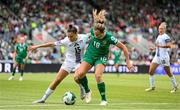 3 June 2025; Kyra Carusa of Republic of Ireland in action against Sara Makovec of Slovenia during the UEFA Women's Nations League, League B match between Republic of Ireland and Slovenia at Páirc Uí Chaoimh in Cork. Photo by Stephen McCarthy/Sportsfile