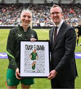 3 June 2025; FAI chief executive officer David Courell makes a presentation to Republic of Ireland international Louise Quinn on the occasion of her last international game before the UEFA Women's Nations League, League B match between Republic of Ireland and Slovenia at Páirc Uí Chaoimh in Cork.