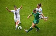 3 June 2025; Katie McCabe of Republic of Ireland in action against Zala Kuštrin and Sara Makovec of Slovenia during the UEFA Women's Nations League, League B match between Republic of Ireland and Slovenia at Páirc Uí Chaoimh in Cork. Photo by Shauna Clinton/Sportsfile