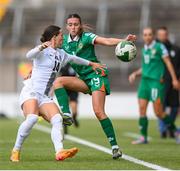 3 June 2025; Abbie Larkin of Republic of Ireland in action against Špela Kolbl of Slovenia during the UEFA Women's Nations League, League B match between Republic of Ireland and Slovenia at Páirc Uí Chaoimh in Cork. Photo by Stephen McCarthy/Sportsfile