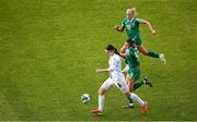 3 June 2025; Kaja Korošec of Slovenia in action against Abbie Larkin of Republic of Ireland during the UEFA Women's Nations League, League B match between Republic of Ireland and Slovenia at Páirc Uí Chaoimh in Cork. Photo by Shauna Clinton/Sportsfile