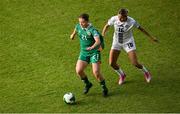 3 June 2025; Emily Murphy of Republic of Ireland in action against Kaja Eržen of Slovenia during the UEFA Women's Nations League, League B match between Republic of Ireland and Slovenia at Páirc Uí Chaoimh in Cork. Photo by Shauna Clinton/Sportsfile