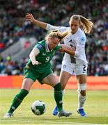 3 June 2025; Amber Barrett of Republic of Ireland /holds off the challenge of Lana Golob of Slovenia during the UEFA Women's Nations League, League B match between Republic of Ireland and Slovenia at Páirc Uí Chaoimh in Cork. Photo by Stephen McCarthy/Sportsfile