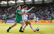 3 June 2025; Emily Murphy of Republic of Ireland in action against Sara Agrež of Slovenia during the UEFA Women's Nations League, League B match between Republic of Ireland and Slovenia at Páirc Uí Chaoimh in Cork. Photo by Stephen McCarthy/Sportsfile