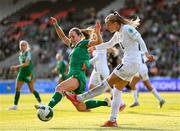 3 June 2025; Zara Kramžar of Slovenia in action against Kyra Carusa of Republic of Ireland during the UEFA Women's Nations League, League B match between Republic of Ireland and Slovenia at Páirc Uí Chaoimh in Cork. Photo by Stephen McCarthy/Sportsfile