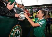 3 June 2025; Republic of Ireland captain Katie McCabe with supporters after the UEFA Women's Nations League, League B match between Republic of Ireland and Slovenia at Páirc Uí Chaoimh in Cork. Photo by Stephen McCarthy/Sportsfile