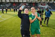 3 June 2025; Republic of Ireland captain Katie McCabe with a supporter after the UEFA Women's Nations League, League B match between Republic of Ireland and Slovenia at Páirc Uí Chaoimh in Cork. Photo by Stephen McCarthy/Sportsfile
