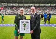3 June 2025; FAI chief executive officer David Courell makes a presentation to Republic of Ireland international Louise Quinn on the occasion of her last international game before the UEFA Women's Nations League, League B match between Republic of Ireland and Slovenia at Páirc Uí Chaoimh in Cork. Photo by Stephen McCarthy/Sportsfile