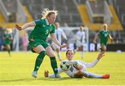 3 June 2025; Amber Barrett of Republic of Ireland is tackled by Sara Agrež of Slovenia during the UEFA Women's Nations League, League B match between Republic of Ireland and Slovenia at Páirc Uí Chaoimh in Cork. Photo by Stephen McCarthy/Sportsfile