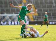 3 June 2025; Amber Barrett of Republic of Ireland is tackled by Sara Agrež of Slovenia during the UEFA Women's Nations League, League B match between Republic of Ireland and Slovenia at Páirc Uí Chaoimh in Cork. Photo by Stephen McCarthy/Sportsfile