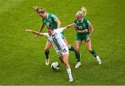 3 June 2025; Sara Makovec of Slovenia in action against Republic of Ireland players Kyra Carusa, left, and Denise O'Sullivan during the UEFA Women's Nations League, League B match between Republic of Ireland and Slovenia at Páirc Uí Chaoimh in Cork. Photo by Shauna Clinton/Sportsfile