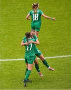 3 June 2025; Saoirse Noonan of Republic of Ireland, centre, is congratulates by team-mates Caitlin Hayes, right, after scoring her side's first goal during the UEFA Women's Nations League, League B match between Republic of Ireland and Slovenia at Páirc Uí Chaoimh in Cork. Photo by Shauna Clinton/Sportsfile