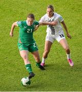 3 June 2025; Emily Murphy of Republic of Ireland in action against Kaja Eržen of Slovenia during the UEFA Women's Nations League, League B match between Republic of Ireland and Slovenia at Páirc Uí Chaoimh in Cork. Photo by Shauna Clinton/Sportsfile