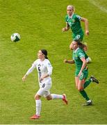 3 June 2025; Kaja Korošec of Slovenia and Republic of Ireland players Abbie Larkin, left, and Denise O'Sullivan during the UEFA Women's Nations League, League B match between Republic of Ireland and Slovenia at Páirc Uí Chaoimh in Cork. Photo by Shauna Clinton/Sportsfile