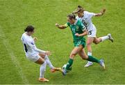 3 June 2025; Katie McCabe of Republic of Ireland in action against Slovenia players Špela Kolbl, left, and Sara Makovec during the UEFA Women's Nations League, League B match between Republic of Ireland and Slovenia at Páirc Uí Chaoimh in Cork. Photo by Shauna Clinton/Sportsfile