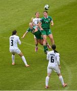 3 June 2025; Republic of Ireland players Emily Murphy, right, and Denise O’Sullivan contest a high ball against Kaja Eržen of Slovenia during the UEFA Women's Nations League, League B match between Republic of Ireland and Slovenia at Páirc Uí Chaoimh in Cork. Photo by Shauna Clinton/Sportsfile