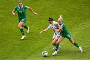 3 June 2025; Sara Makovec of Slovenia is tackled by Denise O'Sullivan of Republic of Ireland during the UEFA Women's Nations League, League B match between Republic of Ireland and Slovenia at Páirc Uí Chaoimh in Cork. Photo by Shauna Clinton/Sportsfile