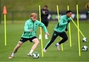 5 June 2025; Liam Scales and Adam Idah, right, during a Republic of Ireland training session at the FAI National Training Centre in Abbotstown, Dublin. Photo by Stephen McCarthy/Sportsfile