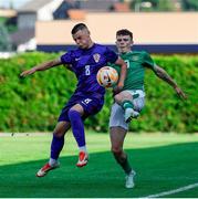 6 June 2025; Jacob Slater of Republic of Ireland in action against Bruno Durdov of Croatia during the U21 international friendly match between Croatia and Republic of Ireland at Gradski Stadion in Zagreb, Croatia. Photo by Gerry Scully/Sportsfile