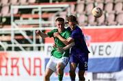 6 June 2025; Warren Davis of Republic of Ireland in action against Teo Barisic of Croatia during the U21 international friendly match between Croatia and Republic of Ireland at Gradski Stadion in Zagreb, Croatia. Photo by Gerry Scully/Sportsfile