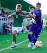 6 June 2025; Sam Curtis of Republic of Ireland in action against Simun Hrgovic of Croatia during the U21 international friendly match between Croatia and Republic of Ireland at Gradski Stadion in Zagreb, Croatia. Photo by Gerry Scully/Sportsfile