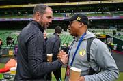 6 June 2025; Republic of Ireland assistant head coach John O'Shea, left, and Senegal advisor El-Hadji Diouf before the international friendly match between Republic of Ireland and Senegal at the Aviva Stadium in Dublin. Photo by Stephen McCarthy/Sportsfile