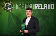 6 June 2025; Archie Quinn of Republic of Ireland with his Boys' Under-15 International Player of the Year award during the 35th FAI International Awards at the Aviva Stadium in Dublin. Photo by David Fitzgerald/Sportsfile