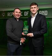 6 June 2025; Freddie Turley of Republic of Ireland, right, is presented with the Mens' Under-19 International Player of the Year award by Republic of Ireland Men's Under-19 Head Coach Tom Mohan during the 35th FAI International Awards at the Aviva Stadium in Dublin. Photo by David Fitzgerald/Sportsfile