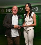 6 June 2025; Aoife Kelly of Republic of Ireland is presented with the Womens' Under-19 International Player of the Year award by Republic of Ireland Women's Under-19 Head Coach Dave Connell during the 35th FAI International Awards at the Aviva Stadium in Dublin. Photo by David Fitzgerald/Sportsfile