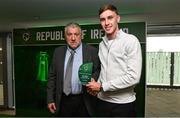 6 June 2025; Matt Healy of Republic of Ireland, right, is presented with the Mens' Under-21 International Player of the Year award by FAI President Paul Cooke during the 35th FAI International Awards at the Aviva Stadium in Dublin. Photo by David Fitzgerald/Sportsfile