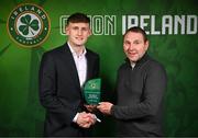 6 June 2025; Freddie Turley of Republic of Ireland, left, is presented with the Mens' Under-19 International Player of the Year award by Republic of Ireland Men's Under-19 Head Coach Tom Mohan during the 35th FAI International Awards at the Aviva Stadium in Dublin. Photo by David Fitzgerald/Sportsfile