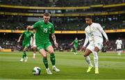 6 June 2025; Jack Taylor of Republic of Ireland in action against Ismail Jakobs of Senegal during the international friendly match between Republic of Ireland and Senegal at the Aviva Stadium in Dublin. Photo by Ben McShane/Sportsfile