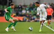 6 June 2025; Ismail Jakobs of Senegal in action against Kasey McAteer of Republic of Ireland during the international friendly match between Republic of Ireland and Senegal at the Aviva Stadium in Dublin. Photo by David Fitzgerald/Sportsfile