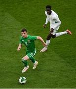 6 June 2025; Jason Knight of Republic of Ireland in action against Boulaye Dia of Senegal during the international friendly match between Republic of Ireland and Senegal at the Aviva Stadium in Dublin. Photo by Piaras Ó Mídheach/Sportsfile