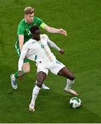 6 June 2025; Boulaye Dia of Senegal in action against Nathan Collins of Republic of Ireland during the international friendly match between Republic of Ireland and Senegal at the Aviva Stadium in Dublin. Photo by Piaras Ó Mídheach/Sportsfile