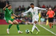 6 June 2025; Ismail Jakobs of Senegal in action against Kasey McAteer of Republic of Ireland during the international friendly match between Republic of Ireland and Senegal at the Aviva Stadium in Dublin. Photo by David Fitzgerald/Sportsfile