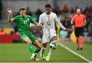 6 June 2025; Ismail Jakobs of Senegal in action against Kasey McAteer of Republic of Ireland during the international friendly match between Republic of Ireland and Senegal at the Aviva Stadium in Dublin. Photo by David Fitzgerald/Sportsfile