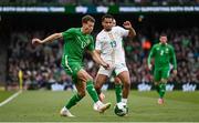 6 June 2025; Kasey McAteer of Republic of Ireland in action against Iliman Ndiaye of Senegal during the international friendly match between Republic of Ireland and Senegal at the Aviva Stadium in Dublin. Photo by Ben McShane/Sportsfile