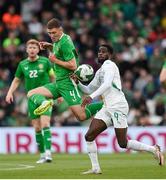 6 June 2025; Dara O'Shea of Republic of Ireland in action against Boulaye Dia of Senegal during the international friendly match between Republic of Ireland and Senegal at the Aviva Stadium in Dublin. Photo by Stephen McCarthy/Sportsfile