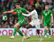 6 June 2025; Dara O'Shea of Republic of Ireland in action against Boulaye Dia of Senegal during the international friendly match between Republic of Ireland and Senegal at the Aviva Stadium in Dublin. Photo by Stephen McCarthy/Sportsfile