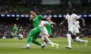 6 June 2025; Adam Idah of Republic of Ireland in action against Ismail Jakobs, centre, and Abdoulaye Seck of Senegal during the international friendly match between Republic of Ireland and Senegal at the Aviva Stadium in Dublin. Photo by Ben McShane/Sportsfile