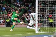 6 June 2025; Kasey McAteer of Republic of Ireland scores his side's first goal during the international friendly match between Republic of Ireland and Senegal at the Aviva Stadium in Dublin. Photo by Ben McShane/Sportsfile