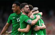 6 June 2025; Kasey McAteer of Republic of Ireland is congratulated by Robbie Brady and Adam Idah after scoring their side's first goal during the international friendly match between Republic of Ireland and Senegal at the Aviva Stadium in Dublin. Photo by Stephen McCarthy/Sportsfile