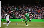 6 June 2025; Kasey McAteer of Republic of Ireland scores his side's first goal during the international friendly match between Republic of Ireland and Senegal at the Aviva Stadium in Dublin. Photo by Stephen McCarthy/Sportsfile
